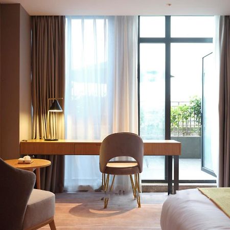 Baian Art Hotel Luzhou Exterior foto